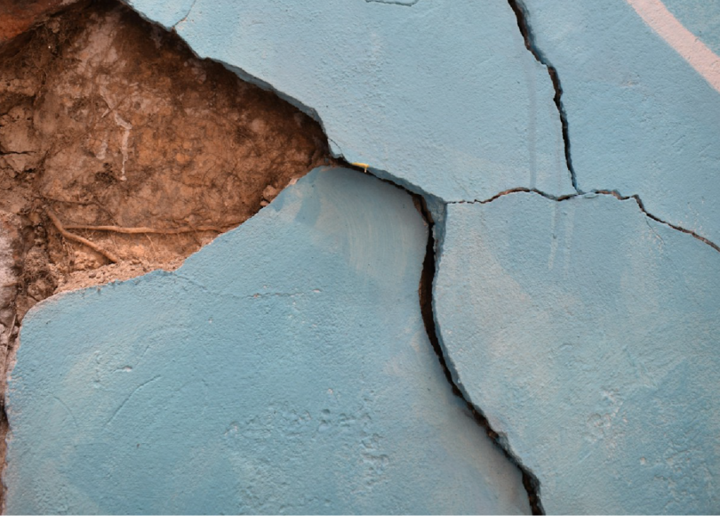 A wall with a crack in the overlay